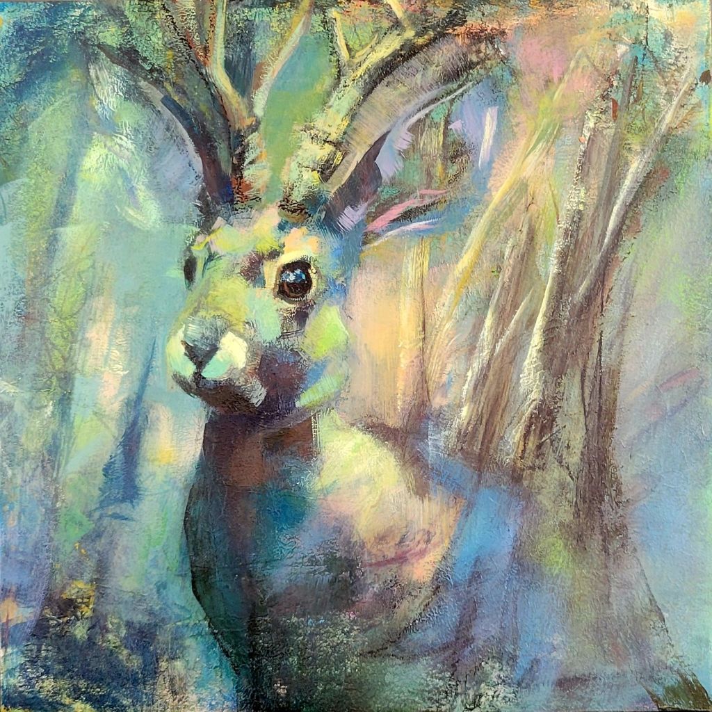 a Jackalope blends into and abstracted forrest. greens and blues set the scene with warmer colors representing light coming from the trees.